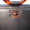 Preowned Chanel™ Vintage Black Calfskin Tortoiseshell Ring Handle Bag 1997-1999