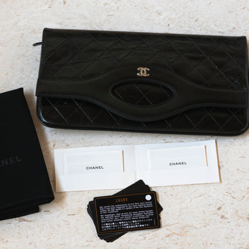 Preowned Chanel™ Quilted Crumpled Calfskin Pochette 31 Clutch Light Gold Hardware A70521