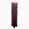 Maroon dress on a hanger against a white background