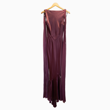 Maroon dress on a hanger against a white background